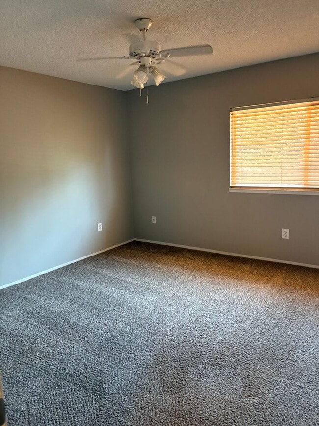 Building Photo - Updated Two Bedroom, 1.5 Bath Condo w/Fire...
