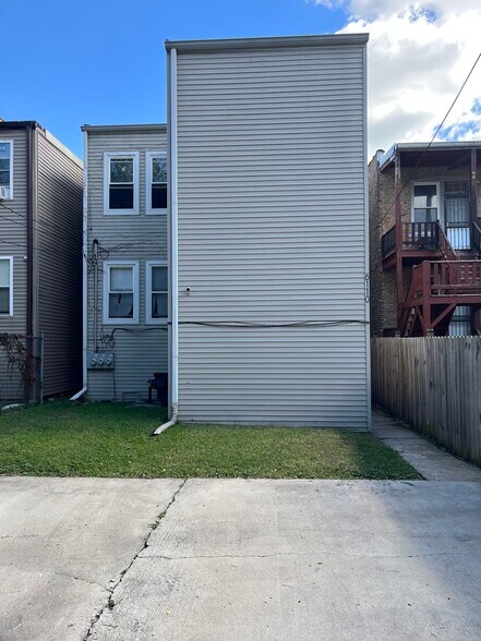 All-weather rear porch enclosure! - 6110 S Evans Ave