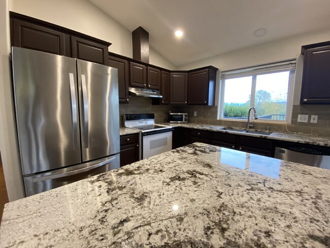 Building Photo - Spacious 4-bedroom with Panoramic Deck Nex...