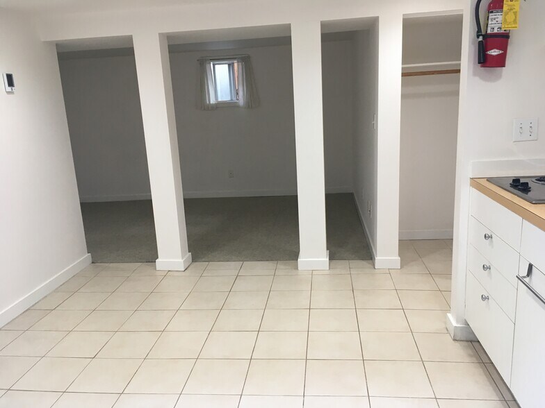 Underfloor heating in the kitchen and bathroom will keep your toes toasty. - 216 W Boston St