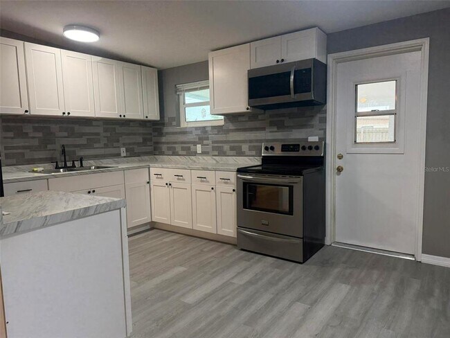 Building Photo - 8096 Rose Terrace N