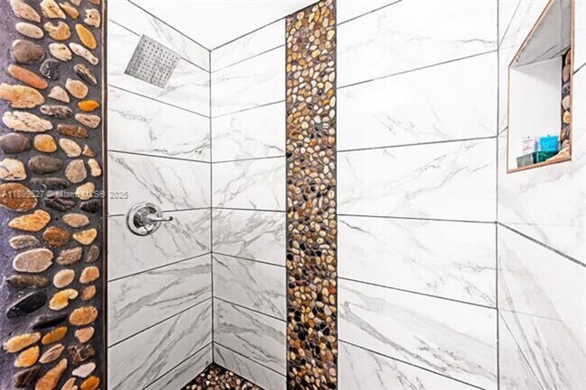 Building Photo - 8888 Collins Ave