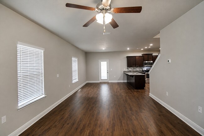 Building Photo - Spacious Pace Home Featuring 4 Bedrooms, 3.5 Baths, Two Living Areas & First-Floor Primary Suite ...
