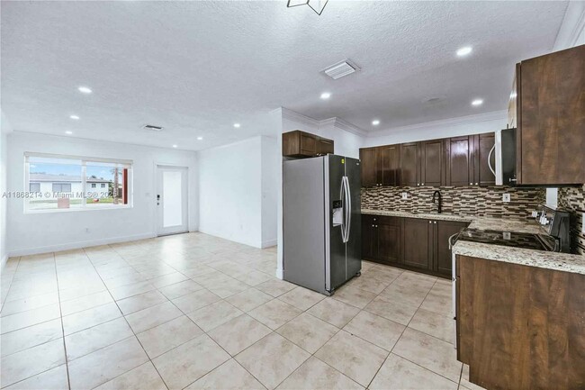 Building Photo - 3230 NW 171st Ter # House MIAMI GARDENS, F...