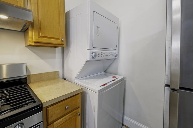 Building Photo - Historic & Charming 3BR Rowhouse near Howard is Move-in Ready!