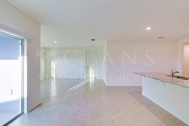 Building Photo - Never Lived in 4 Bed, 2 Bath Ormond Home with Upgrades and a Fenced Yard