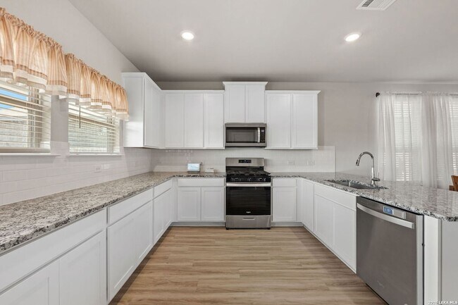 Building Photo - 6410 Comanche Sky