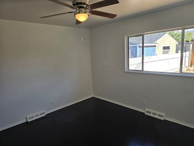 Building Photo - Nice size 4 Bedroom  2 Bath with 2 living ...