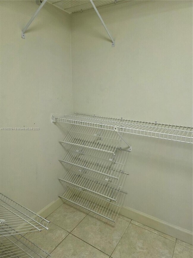 Building Photo - 9917 W Okeechobee Rd