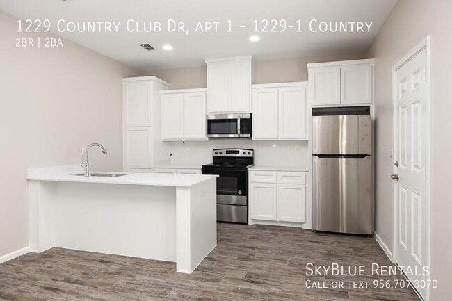 Building Photo - 1229 Country Club Dr