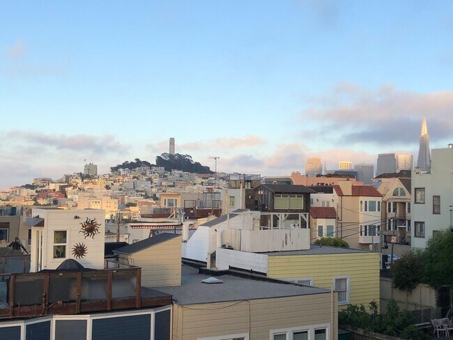Building Photo - RENOVATED 3BR w/ Dining Room. VIEWS! Parking Avail., FREE Laundry!