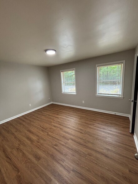 Two spacious bedrooms with plenty of natural light. - 1526 Charter East Cir