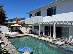 Building Photo - Coastal Elegance Meets Family Comfort in D...