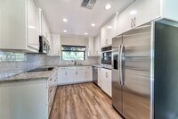 Building Photo - Spacious 4-Bedroom Home with Modern Amenities & Great Location