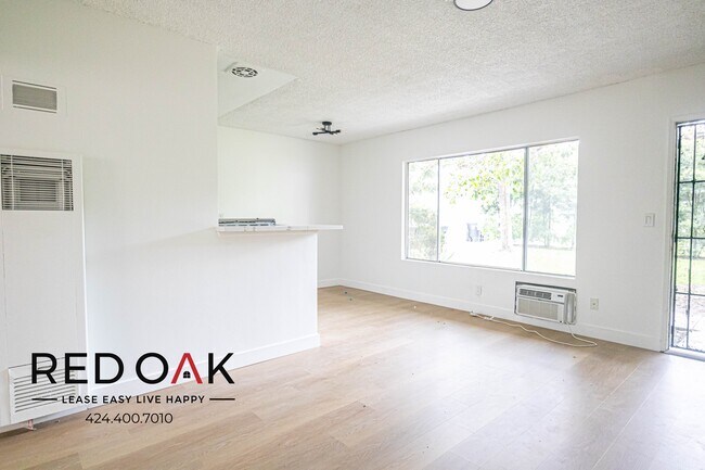 Primary Photo - Spacious, Bright, and Completely Remodeled...