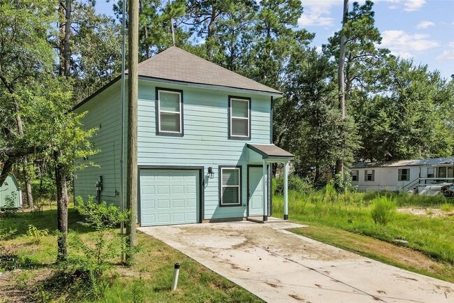 Building Photo - For lease in the sought-after Cedar Point community, this delightful home boasts 1,065 square fee...