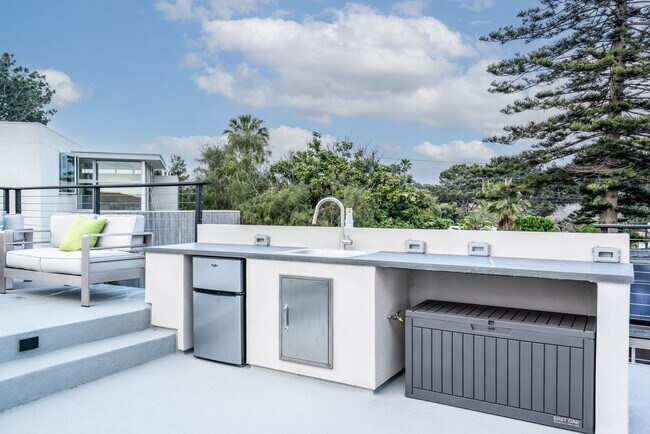 Building Photo - Enjoy stunning sunsets and beach living at its finest, Short Walk to Beach