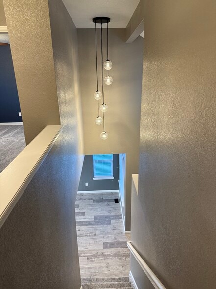 Staircase from 2nd floor to main floor - 7153 Arrowroot Ave