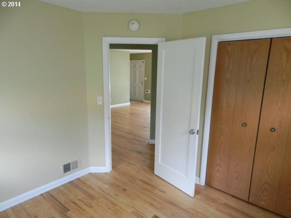 Bedroom 1. Walls have been painted since photo. - 9003 SE Stephens St