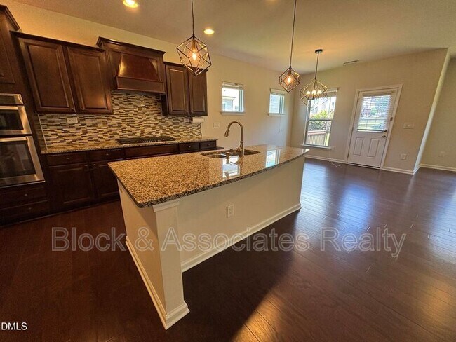 Building Photo - 1009 Magnolia Blossom Ln