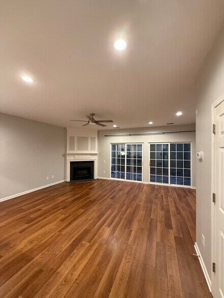 Living room with gas fireplace - 6617 Rothchild Dr