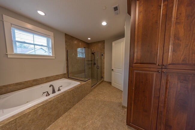 Building Photo - 2 Creeks Condominiums - Gated Community on...