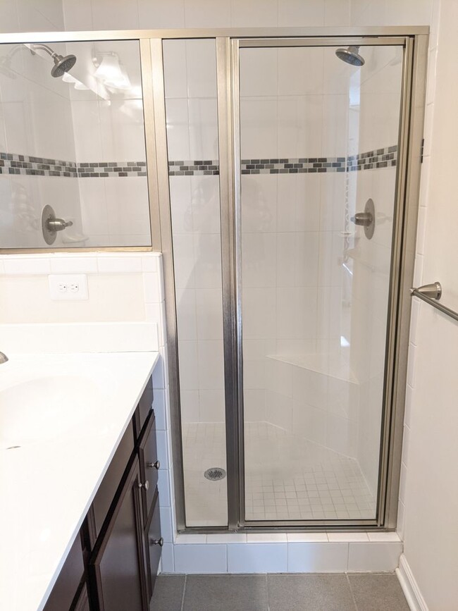 Building Photo - Bottom level (two story) *END UNIT* condo ...