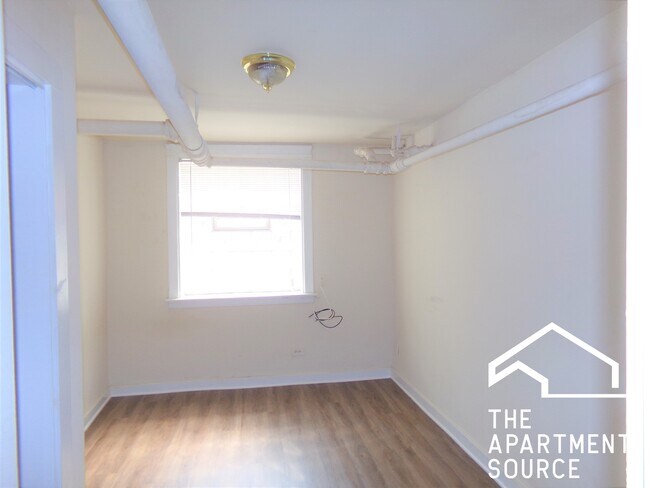 Building Photo - 6574 N Lakewood Ave