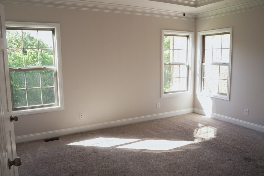 Large Primary Bedroom With Crown Molding, Fan and views over looking Green Spaces (15x14) - 393 Hays Blvd