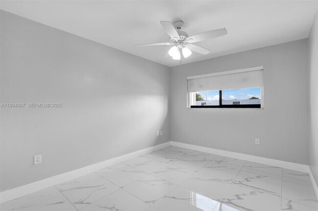 Building Photo - 5061 W 12th Ln