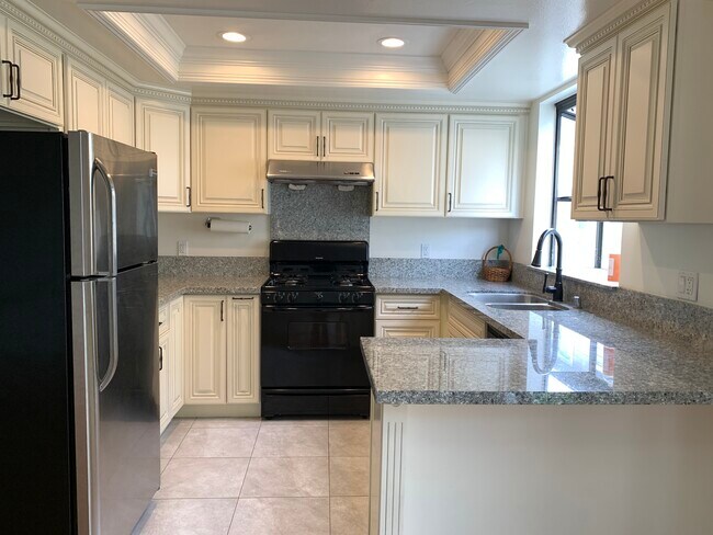 Building Photo - 15220 S Normandie Ave