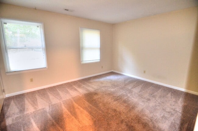 Building Photo - Walk to Downtown Carrboro From This End Unit Townhome!