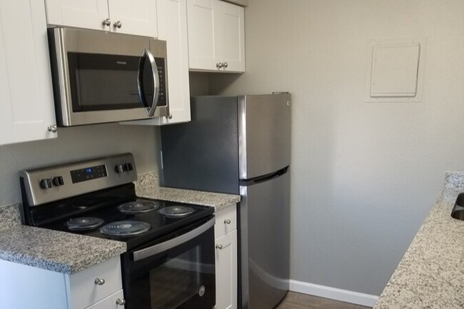 Stainless Steel appliances in kitchen - Axio Apartments