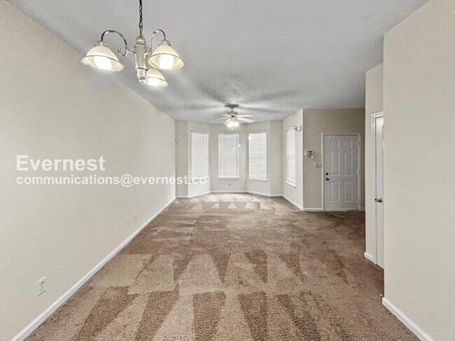 Building Photo - 3 Bed, 1.5 Bath Townhome with Fenced Yard / Pet-Friendly / Coming Soon!