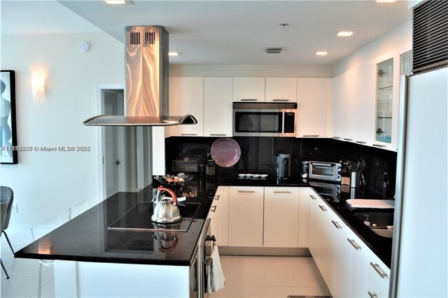 Building Photo - 6899 Collins Ave