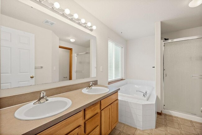 Building Photo - Spacious 4-Bedroom Olympia Home with A/C, Stunning Accents & Walk In Pantry!