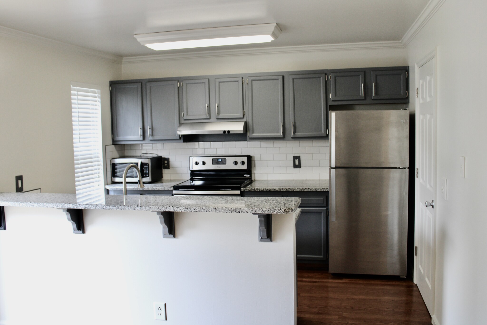 Kitchen with stainless appliances - 163 37th Avenue North