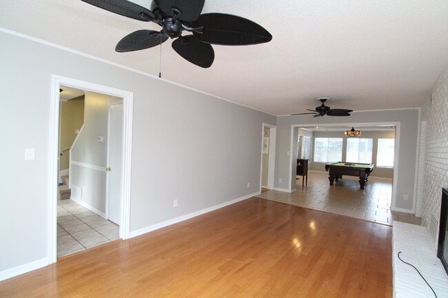 Building Photo - Pool Home with Office, Two Primary Suites ...