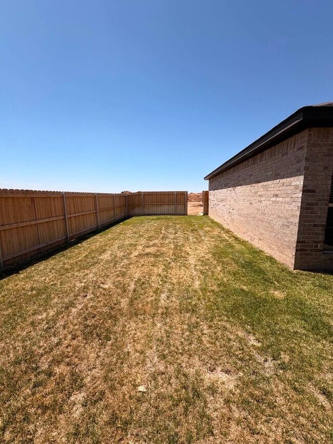 Building Photo - Stunning New 3/2 Townhomes