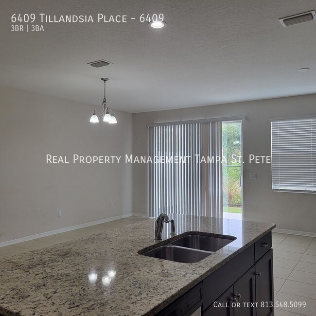 Building Photo - 6409 Tillandsia Pl