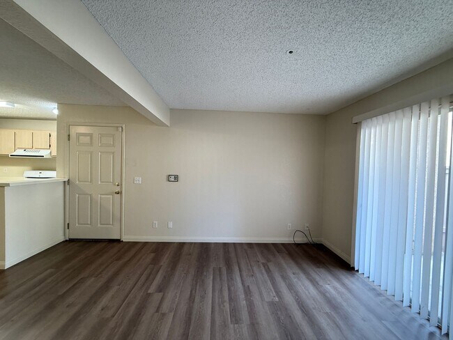 Building Photo - Downstairs Corner Condo in the Gated Commu...