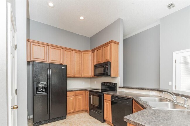 Building Photo - 6723 Breezy Palm Dr