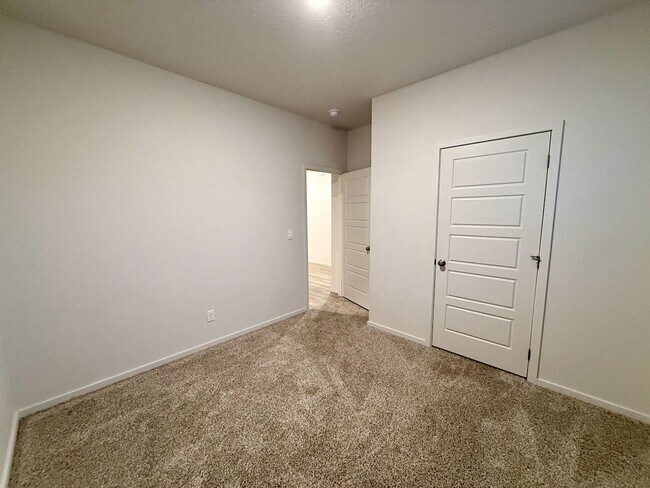 Building Photo - New Construction 4 Bed Mead School District Rancher w/ Fully-Fenced Yard and Attached Garage!