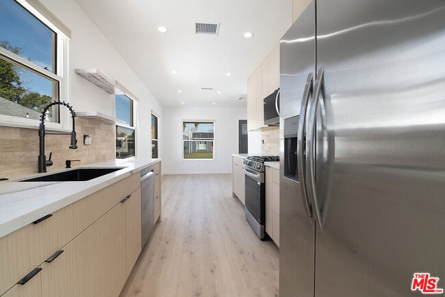 Building Photo - 17638 Welby Way