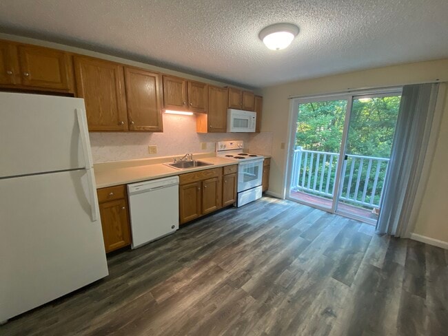 Eat-in Kitchen - Homestead Apartments