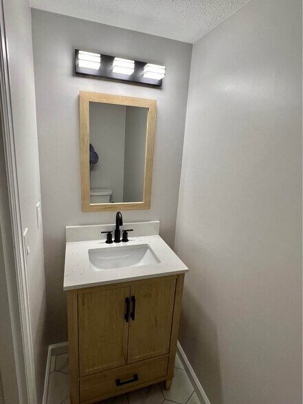 1st Floor half bathroom - 65 Jamestown Dr