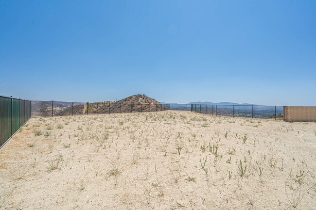 Building Photo - Spacious 5-Bedroom Home with Community Ame...