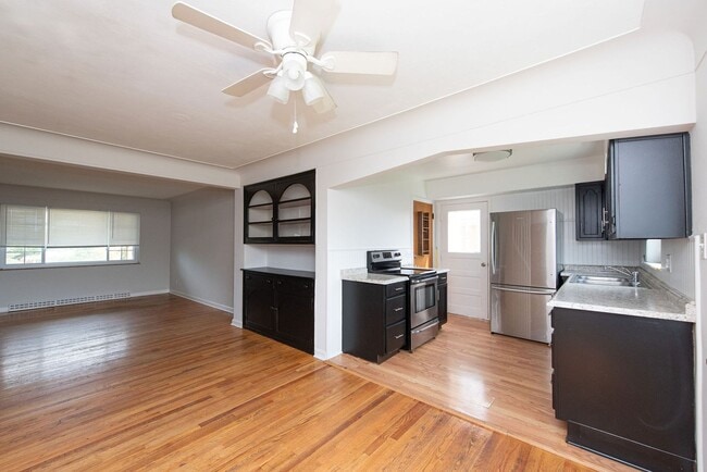 Building Photo - WESTWOOD-4 BEDROOM 2 BATH WITH OPEN FLOOR ...