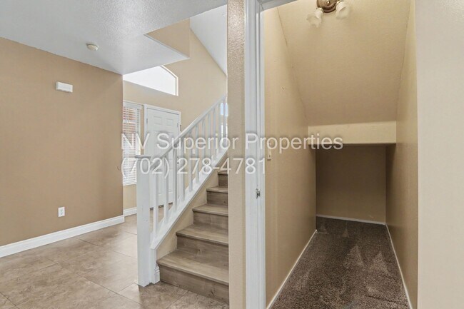 Building Photo - NW!! 4 bedrooms!! Bed & Bath DownStairs!!! RV Parking!!! Synthetic Grass Front yard!! Real Grass ...