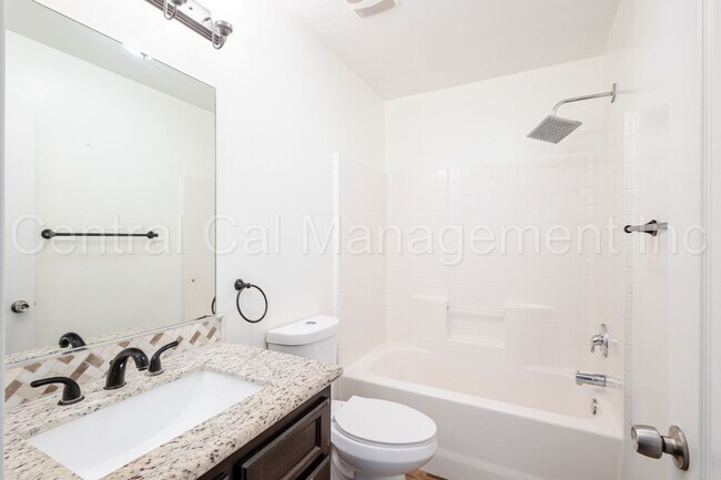 Building Photo - 4 Bedroom/2 Bath Home with Paid Solar - $2...